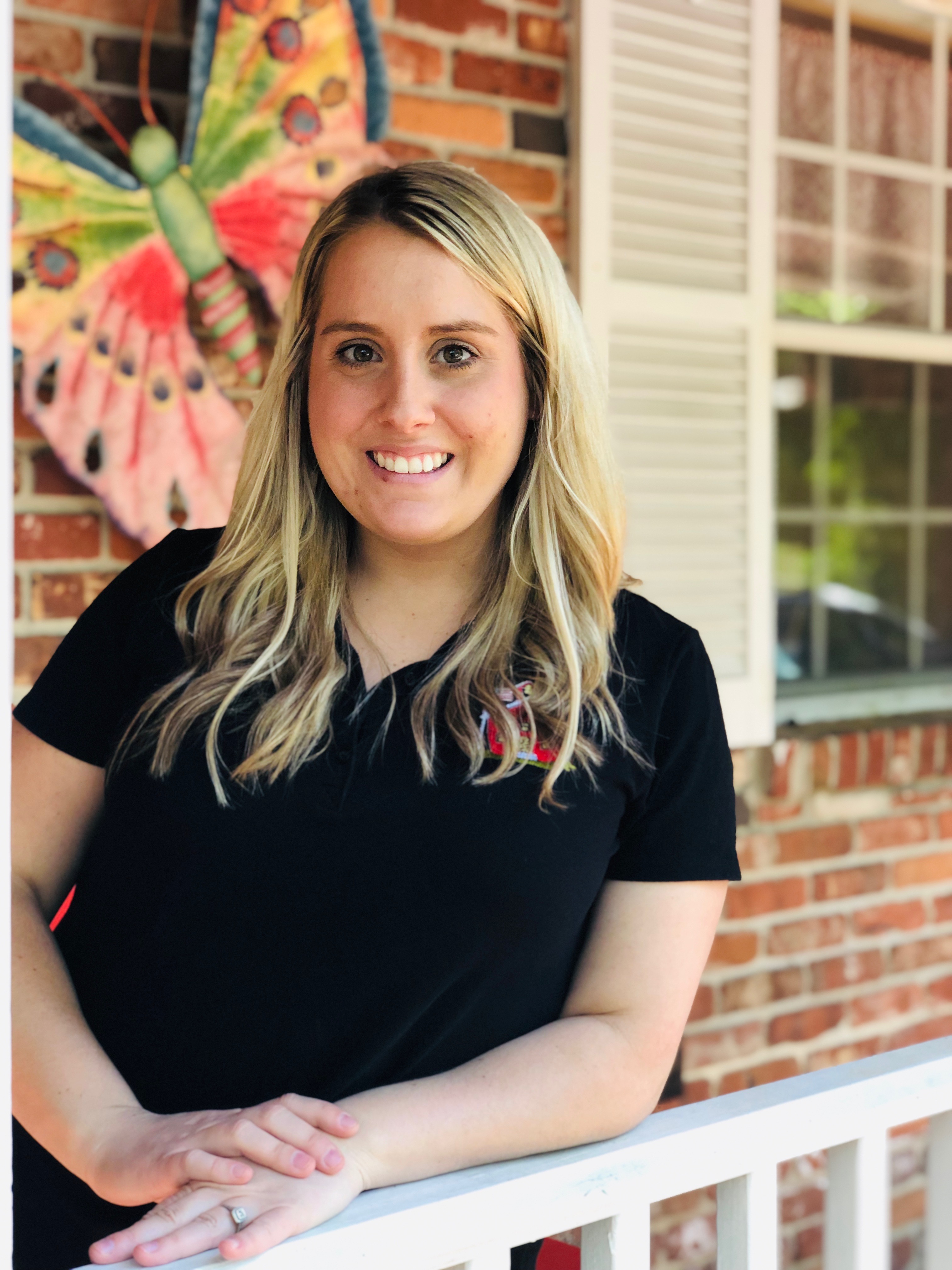 A photo of our assistant director, Mrs. Haylie.